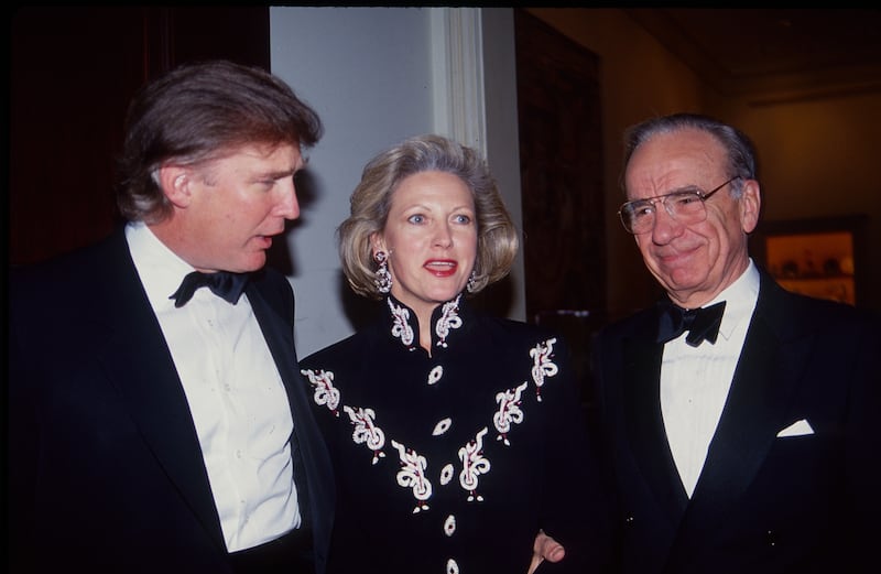 President Donald Trump has long had ties to Rupert Murdoch, and the pair are pictured here in 1993.