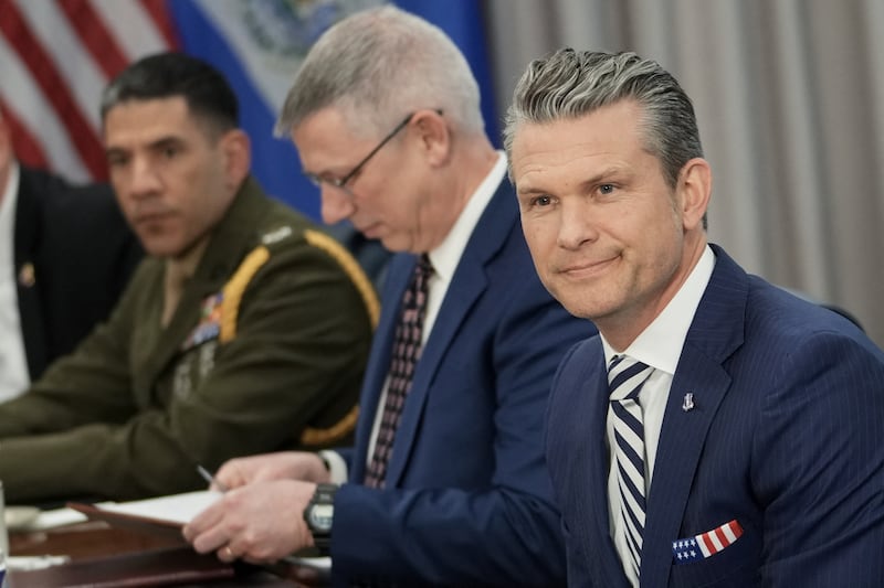 Defense Secretary Pete Hegseth (R) looks on during a meeting Salvadoran Defense Minister Rene Merino Monroy (out of frame) at the Pentagon in Washington, DC on April 16, 2025.