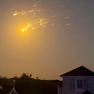 A view shows debris streaking through the sky, after SpaceX's Starship spacecraft tumbled and exploded in space, in Big Sampson Kay, Bahamas, March 6, 2025, in this screen grab obtained from social media video.