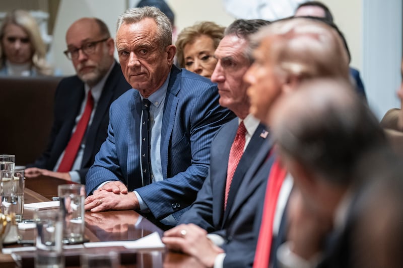Health and Human Services Secretary Robert F. Kennedy Jr. listens as President Donald J Trump speaks at his first cabinet meeting of his second term at the White House on Wednesday, Feb 26, 2025 in Washington, DC.