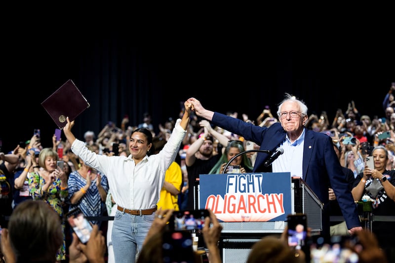 Representative Alexandria Ocasio-Cortez (D-NY) and Senator Bernie Sanders (I-VT) participate in a stop on their "Fighting Oligarchy" tour in Bakersfield, California April 15, 2025.