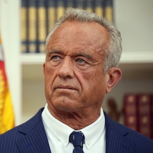 WASHINGTON, DC - FEBRUARY 13: Robert F. Kennedy Jr. listens as U.S. President Donald Trump speaks before Kennedy is sworn in as Secretary of Health and Human Services in the Oval Office at the White House on February 13, 2025 in Washington, DC. Kennedy, who faced criticism for his past comments on vaccine, was confirmed by the Senate 52 to 48. Former Senate Republican Leader Mitch McConnell (R-KY) was the only Republican to vote against him.  (Photo by Andrew Harnik/Getty Images)