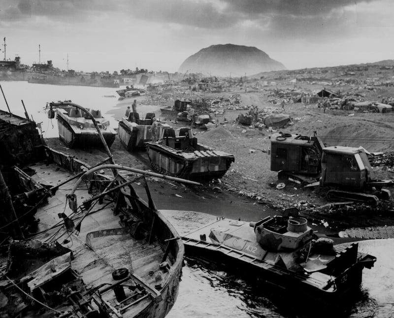 Wrecked U.S. Marine vehicles litter an Iwo Jima beach, 1945. Courtesy U.S. National Archives/U.S. Navy Petty Officer 3rd Class Robert M. Warren/Handout via REUTERS ATTENTION EDITORS - THIS IMAGE HAS BEEN SUPPLIED BY A THIRD PARTY PLEASE SEARCH "FROM THE FILES - 75TH ANNIVERSARY OF THE BATTLE OF IWO JIMA” FOR ALL PICTURES