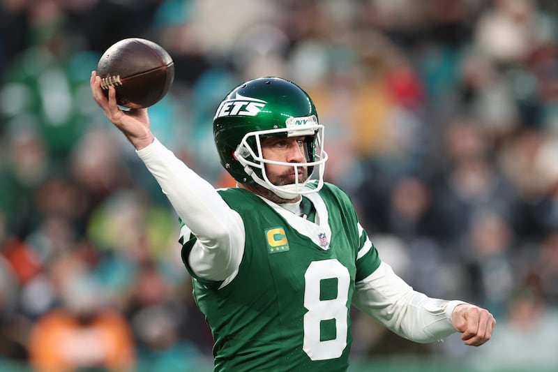 Aaron Rodgers throws a pass against the Miami Dolphins in the first quarter at MetLife Stadium on Jan. 5 in New Jersey.