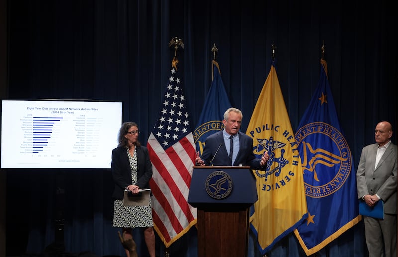 U.S. Secretary of Health and Human Services Robert F. Kennedy Jr. (2nd R) speaks as Associate Professor at Rutgers NJMS and Director of New Jersey Autism Study Walter Zahorodny (R) listens during a news conference at the Department of Health and Human Services on April 16, 2025 in Washington, DC. Secretary Kennedy held a news conference to discuss the recent surge of autism cases.